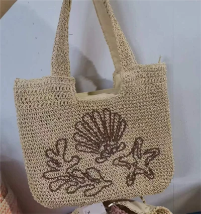 Papir hæklet skuldertaske med broderimønster